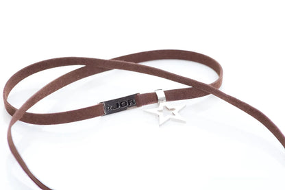 Brown suede jor bracelet choker with silver star pendant and black rectangular tag engraved with jor size one size
