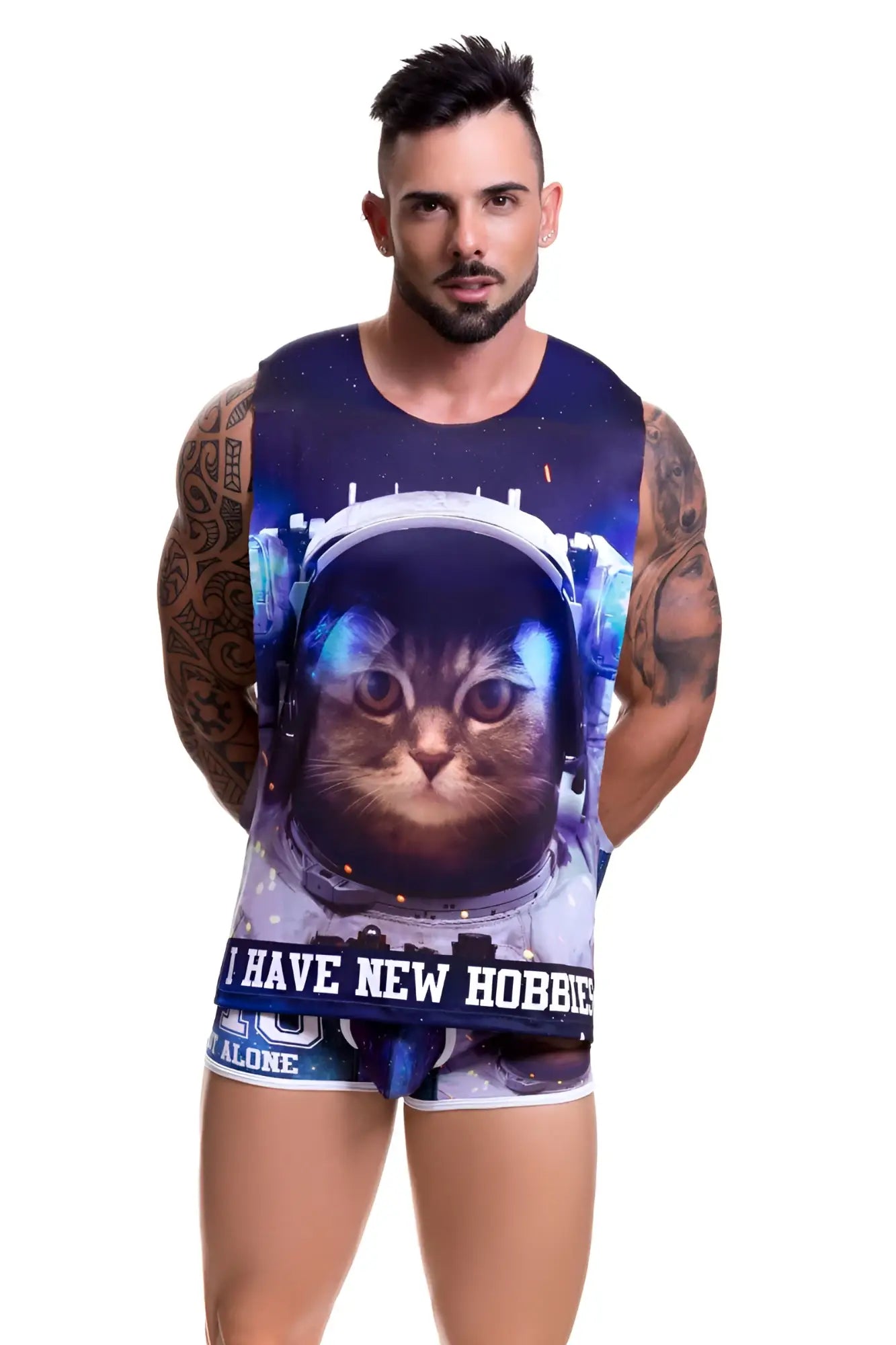 A navy blue jor galactic sleeveless tank top with a tabby cat astronaut graphic and i have new hobbies text in size XL
