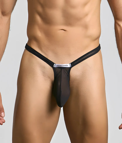 Black sheer mesh bulge thong with silver justin simon label at center for a stylish bold look