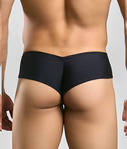 Black form-fitting justin + simon cheek briefs with subtle textured fabric and centered back seam shown from the back