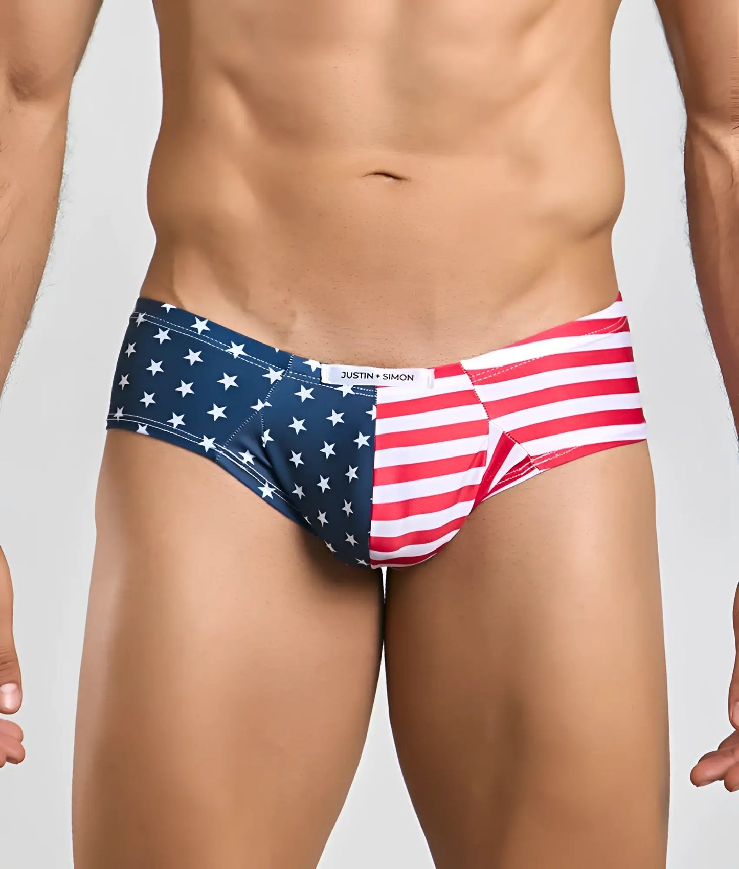 Blue and red american flag patterned briefs with white stars and stripes featuring justin simon brand label