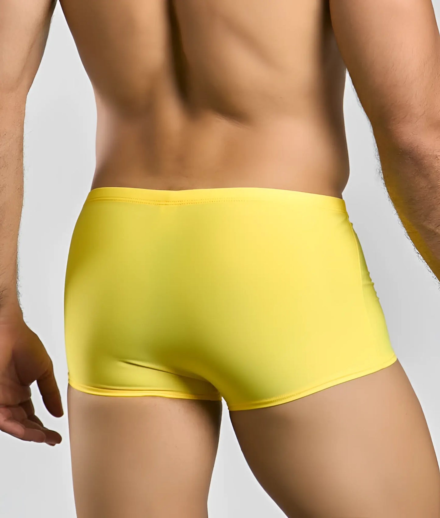 Bright yellow justin + simon classic boxer swim trunks with smooth stretchy fabric and form-fitting design