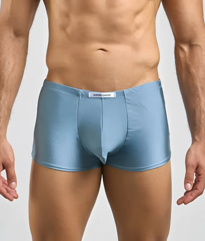 Justin + Simon classic boxer light blue shiny satin briefs with white brand tag at the waistband front view