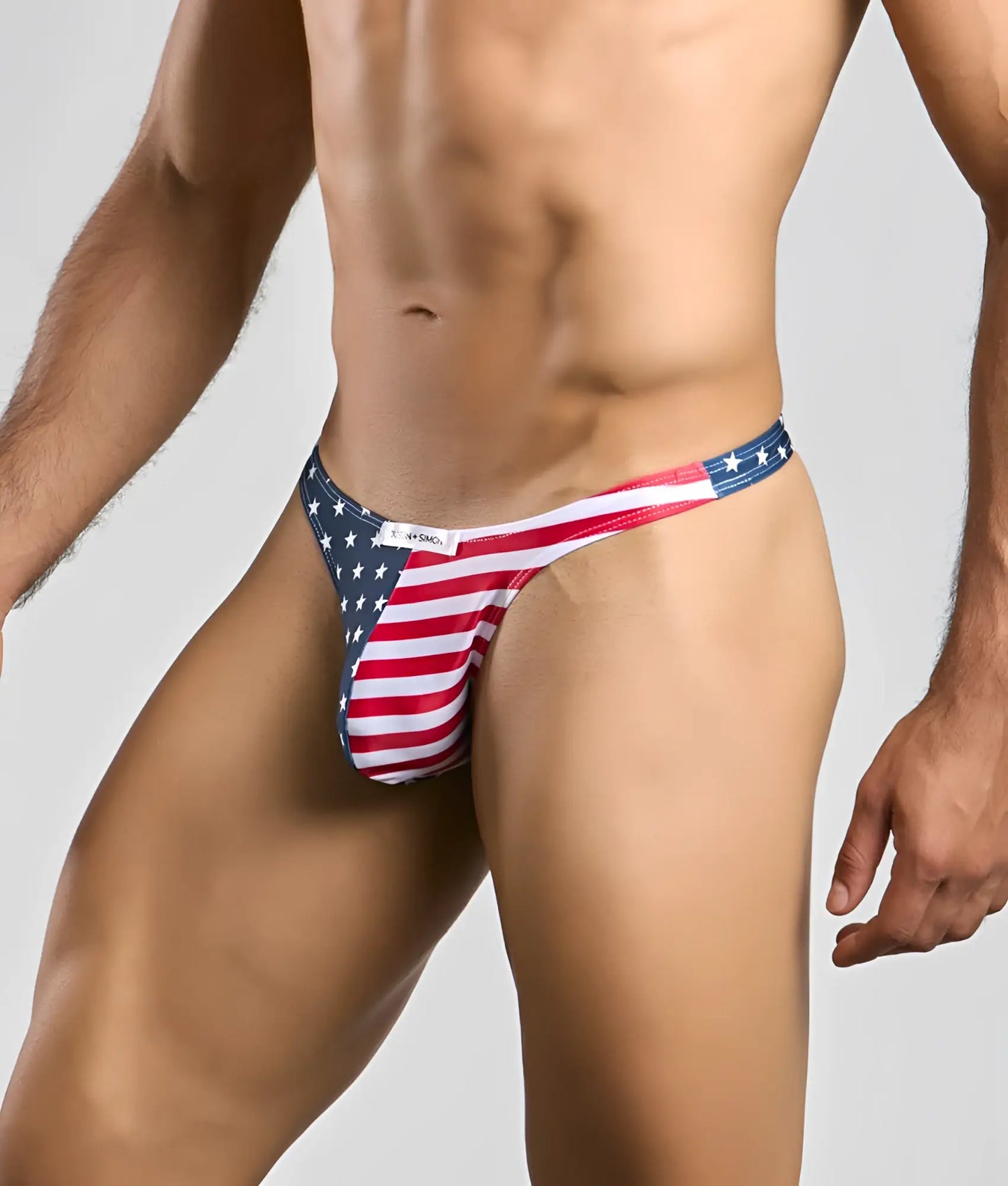 Justin plus Simon classic tanga American flag thong in red white and blue stretchy fabric shown from the back side