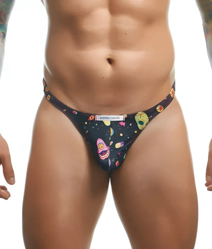 Black thong with vibrant cosmic design featuring colorful alien faces planets and geometric shapes from Justin plus Simon
