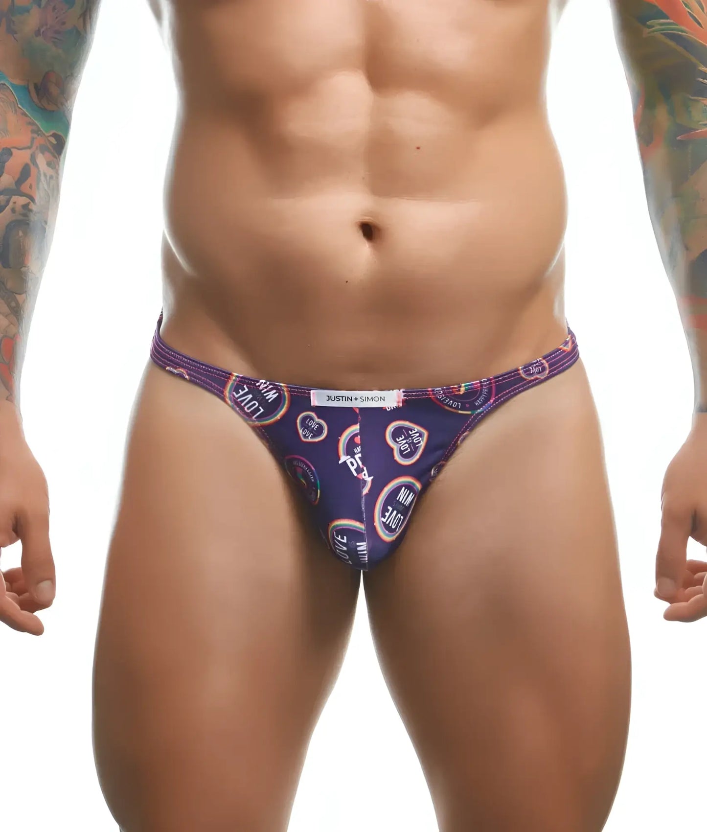 Purple patterned thong with love and circular designs in white pink and blue from Justin plus Simon classic tanga fun prints