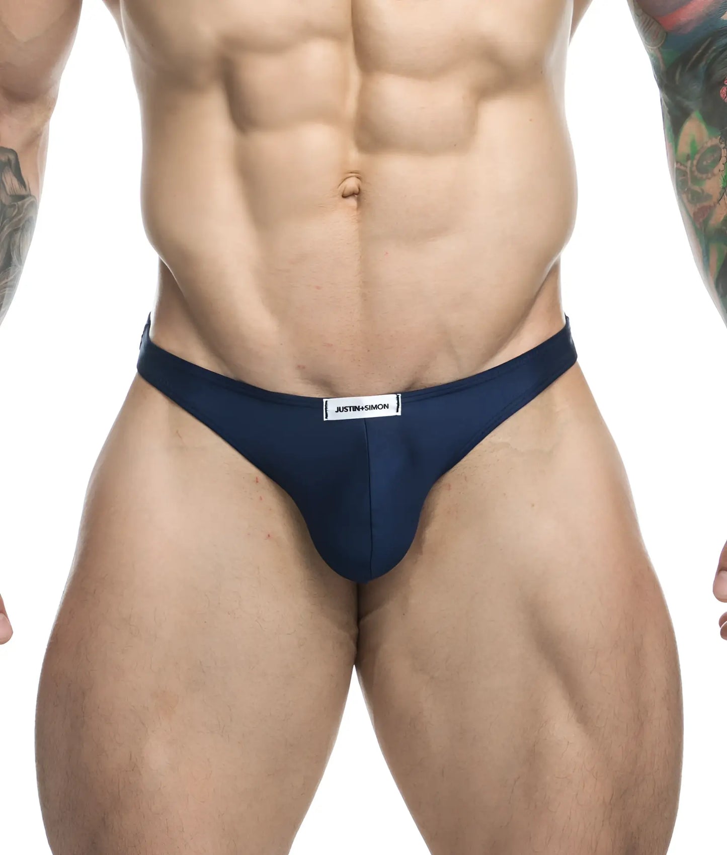 Navy blue Justin and Simon classic tanga briefs with white waistband label made from soft breathable fabric