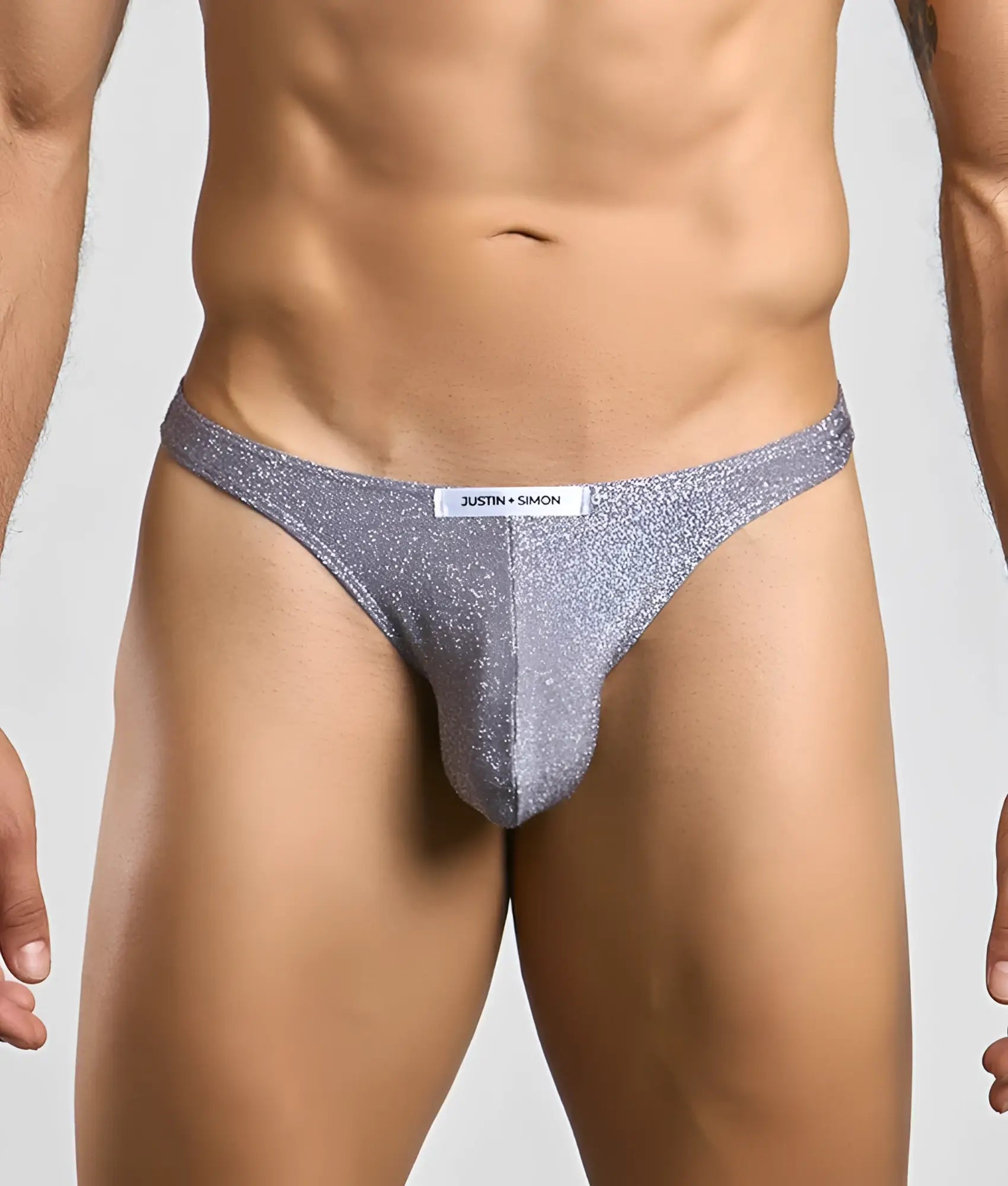 Silver glittery classic tanga thong from justin simon showcasing its sparkling fabric and sleek design