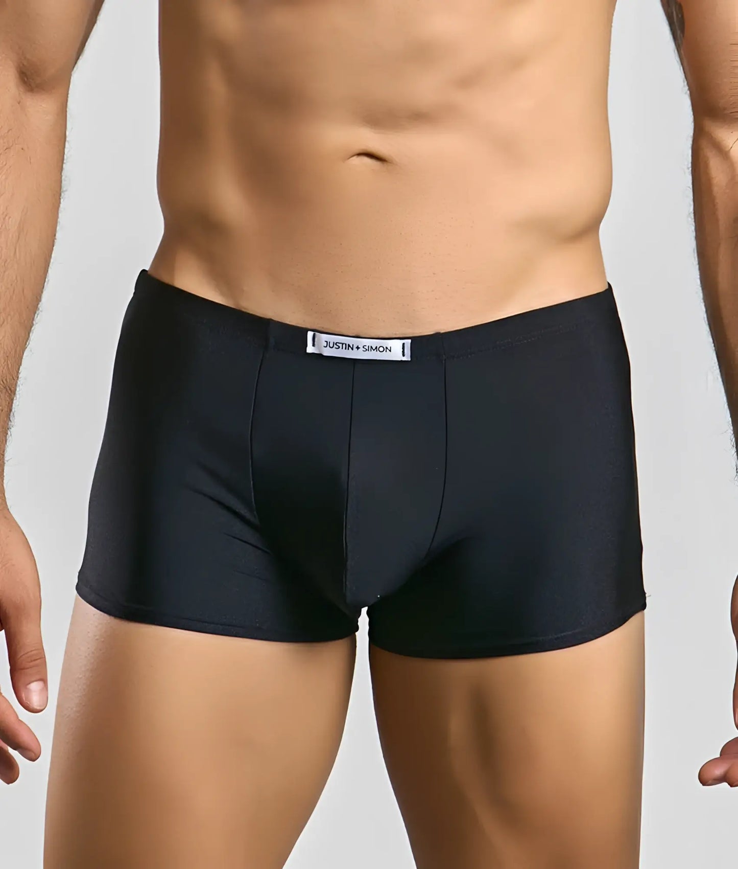 Black justin simon classic boxer men’s briefs with smooth stretchy fabric and branded waistband label