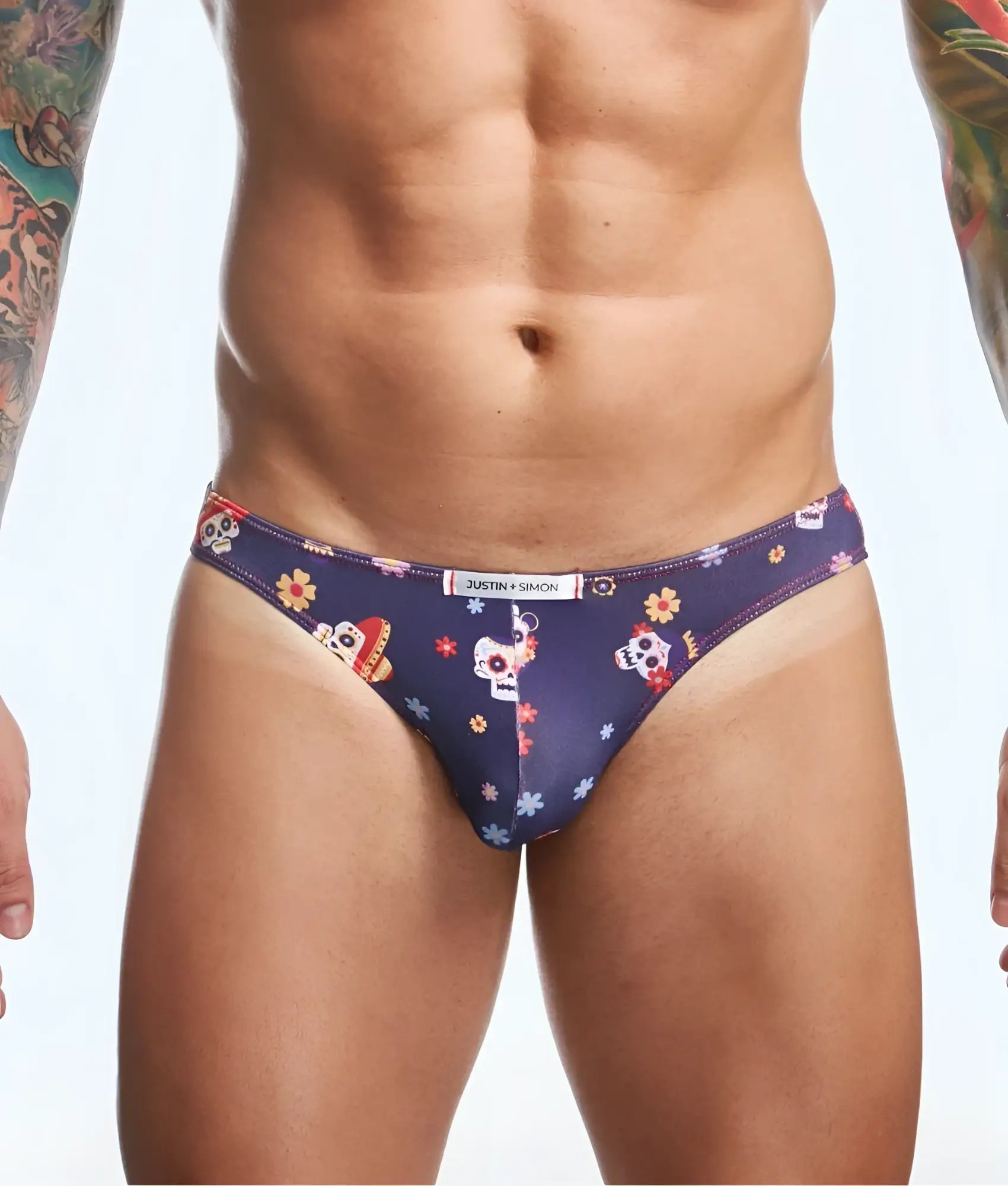 Dark blue mens briefs with vibrant sugar skull and floral pattern and justin simon waistband in classic fun prints