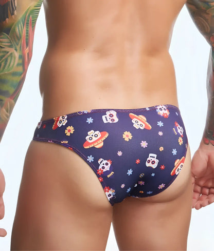 Dark blue mens swim trunks by justin + simon featuring a fun print of cartoon skulls with sombreros and flying saucers