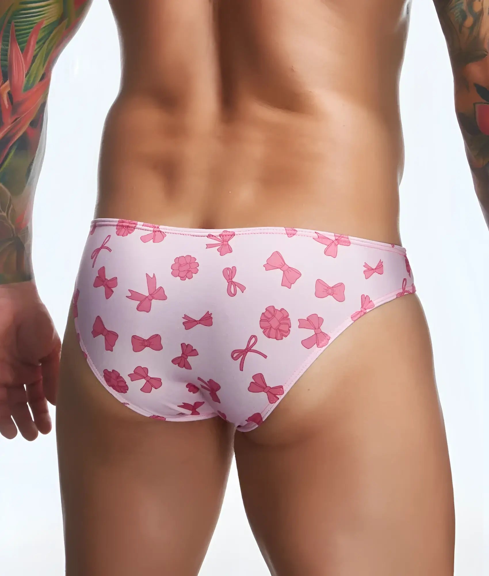 Justin plus Simon classic mens bikini swim trunks with pink bow and flower pattern perfect for fun prints swimwear