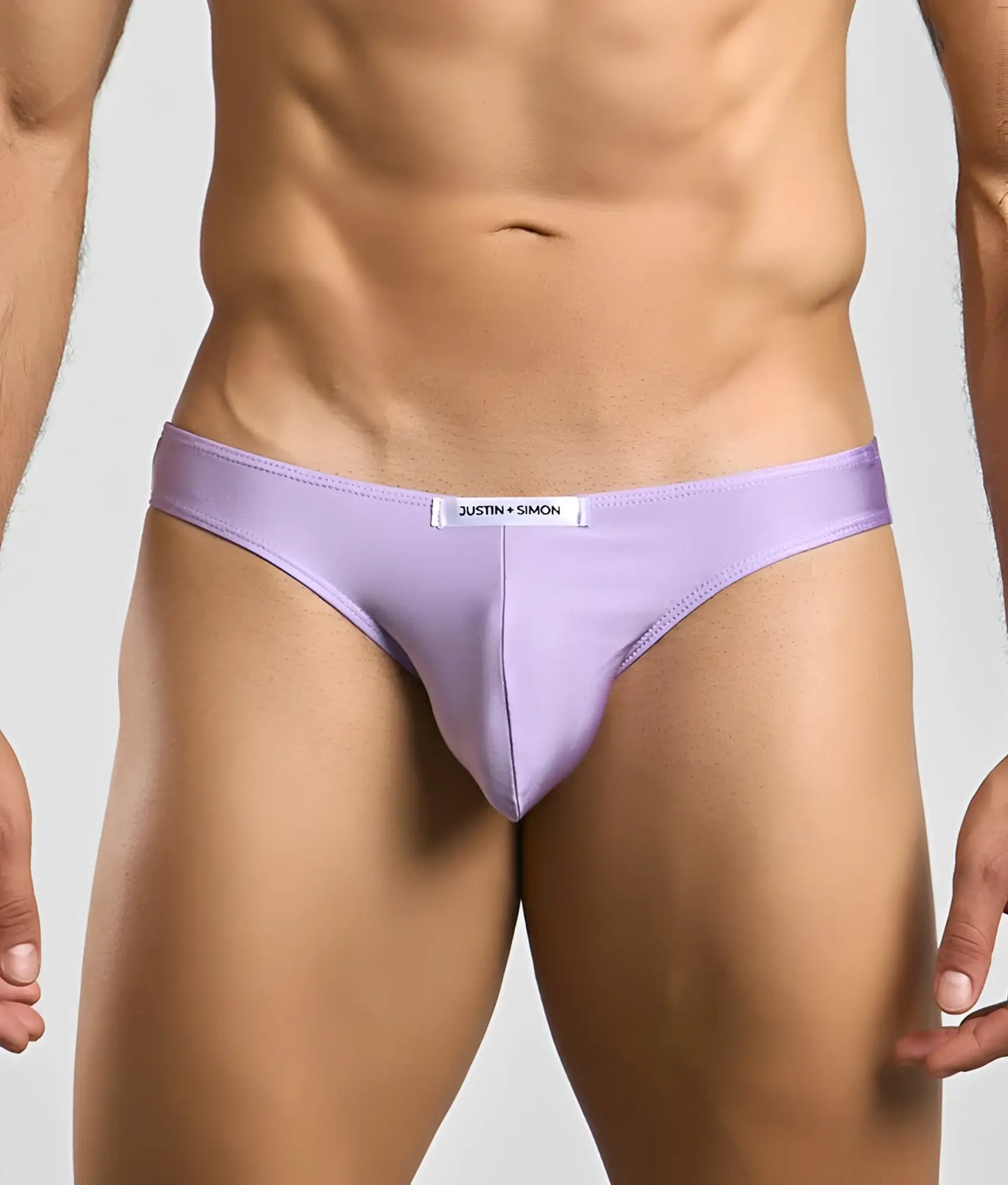 Lavender Justin Simon classic mens bikini briefs with sleek form-fitting design and subtle waistband brand tag