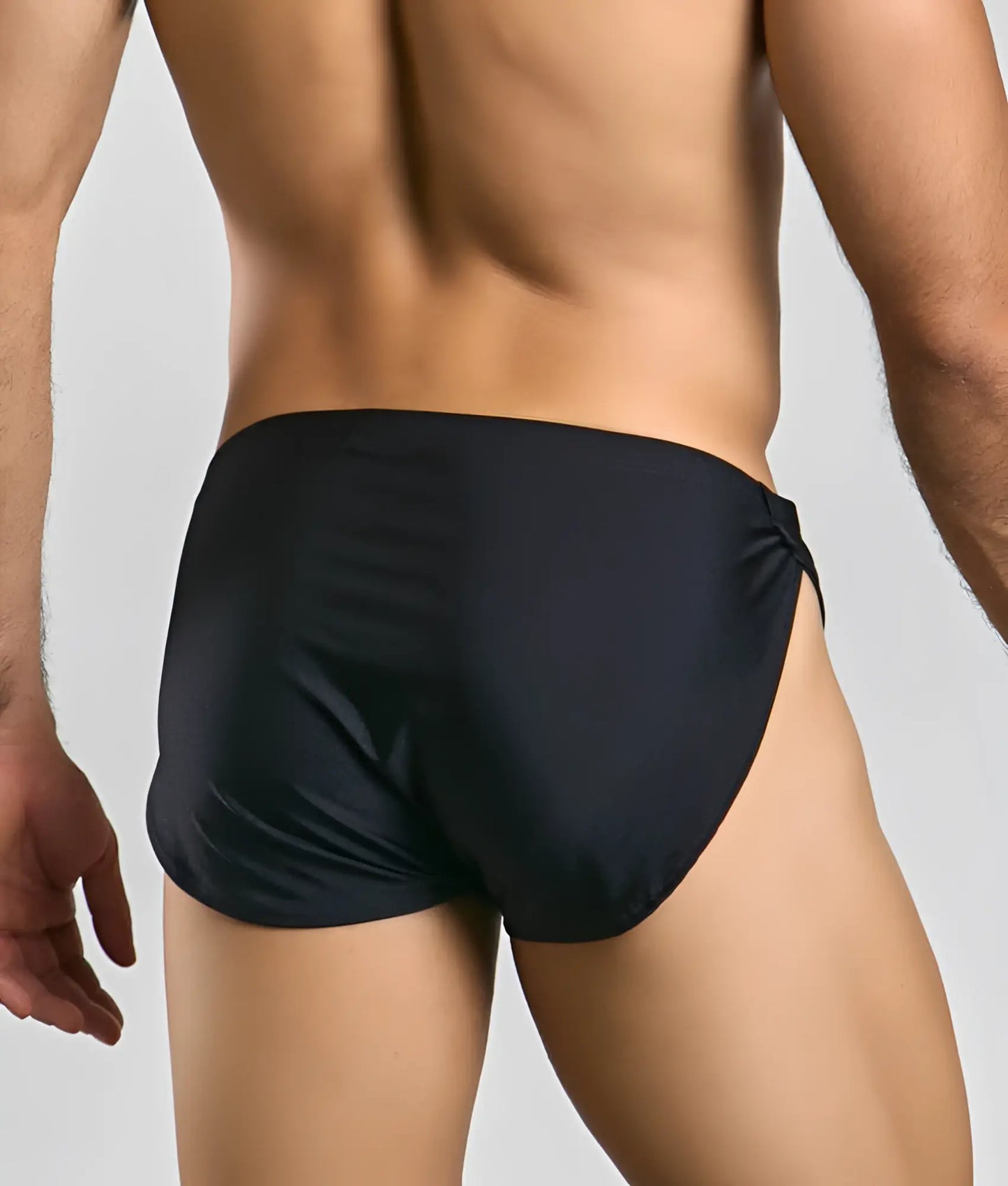 Black sleek swim trunks justin + simon running short with tailored fit and side-tie design for swimming