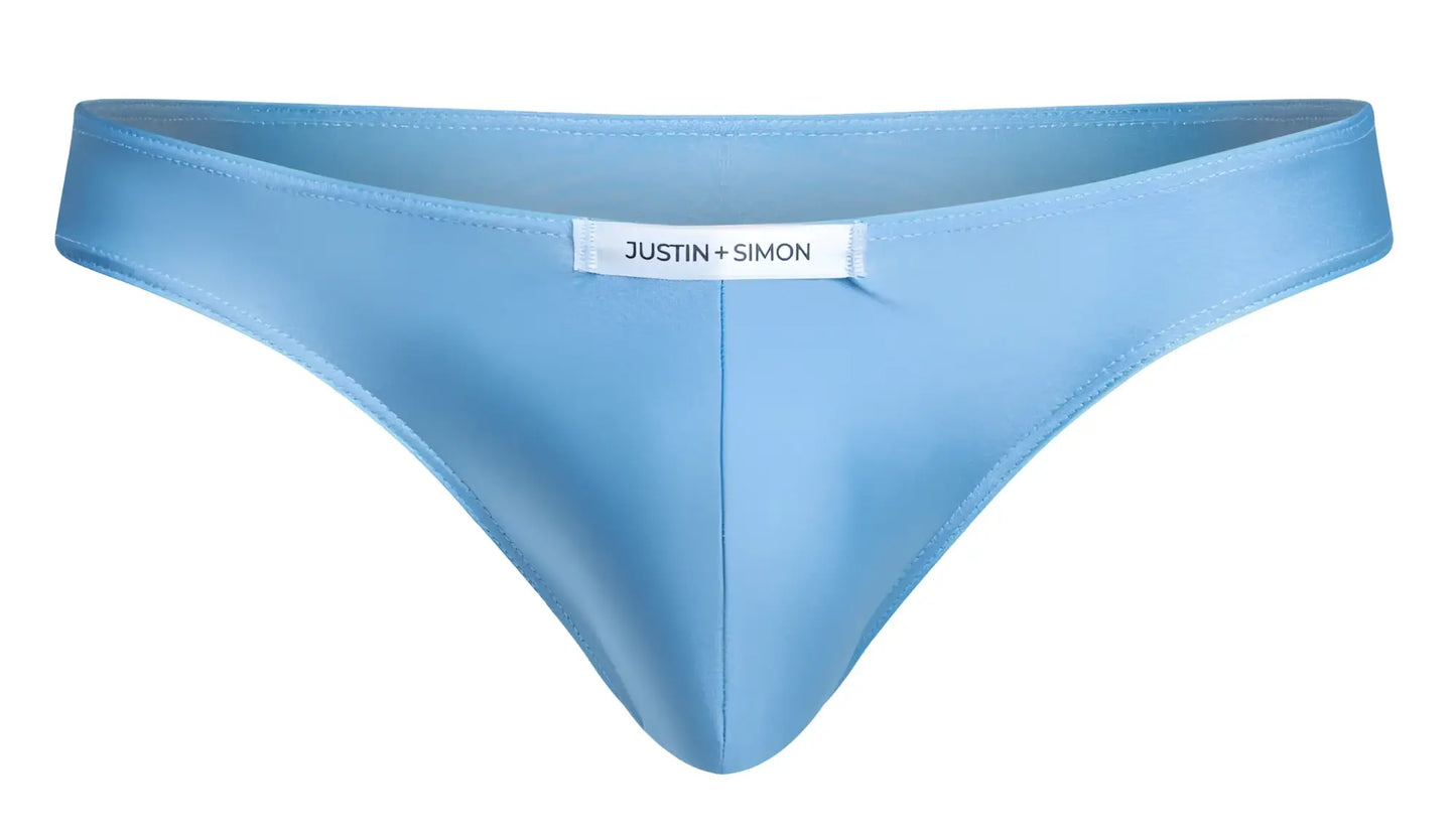 Light blue satin thong from justin simon classic bikini collection showing smooth satin fabric and baby blue color