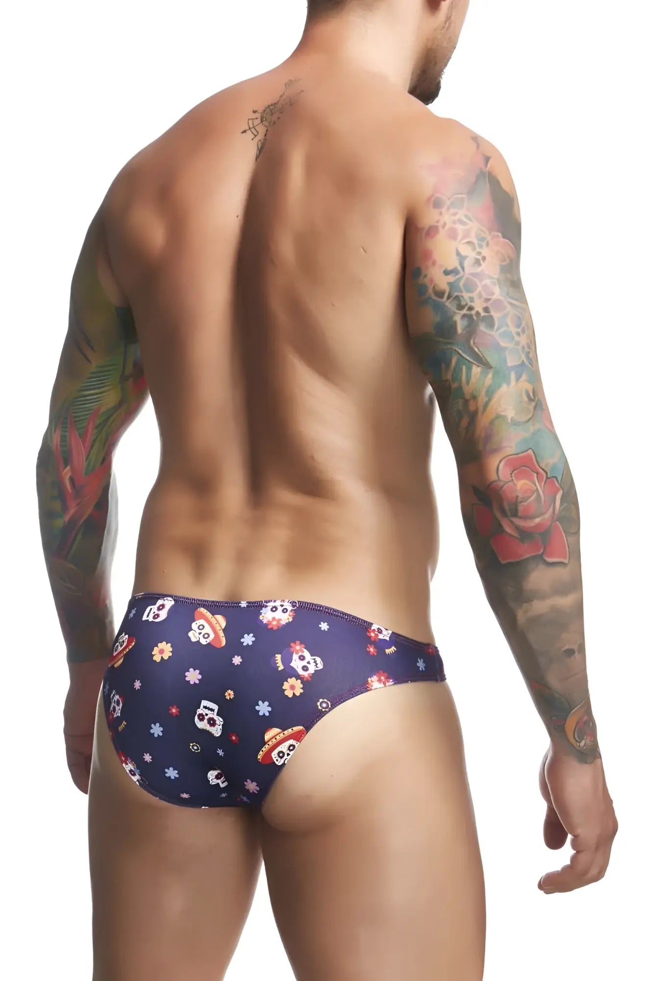 Dark blue men’s swim trunks justinsimon xsj01 with colorful skulls wearing sombreros and small flowers pattern