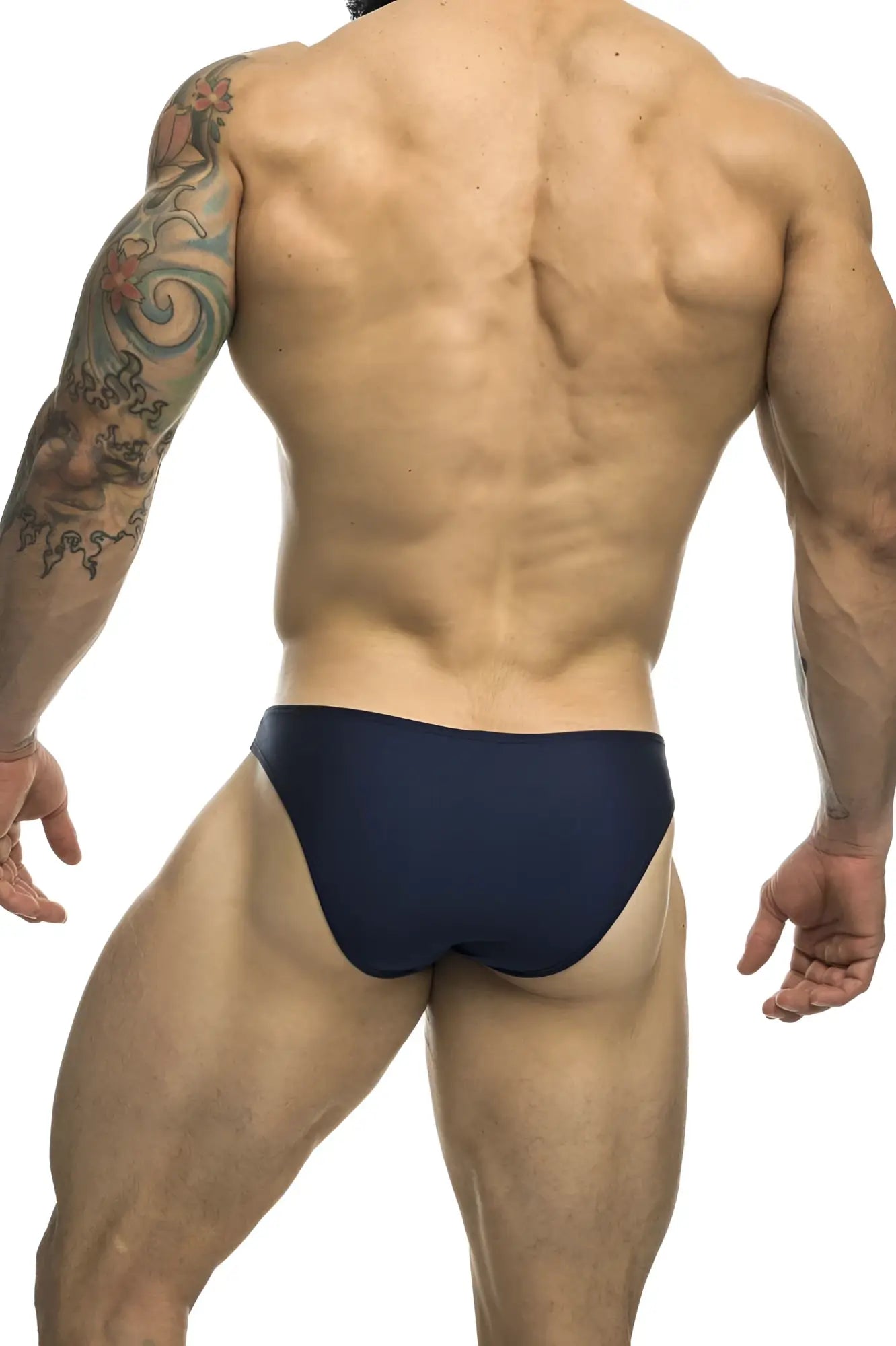 Navy blue classic bikini briefs by justin simon made from soft fabric showing the front side of the product