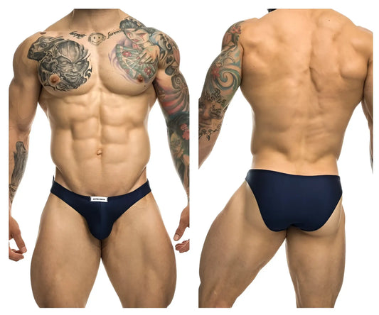 Navy blue justin simon classic bikini briefs with a small white brand tag at the waistband for athletic use