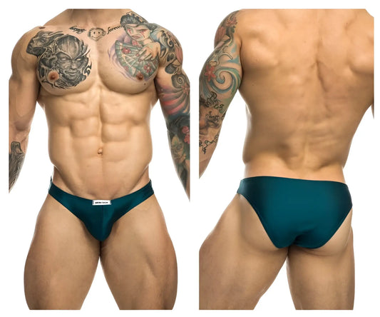 Teal athletic briefs with a small white brand tag at the waistband from justin+simon classic bikini opal green