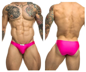 Vibrant pink high-waisted swim trunks by justin simon xsj01 with sleek form-fitting design and white brand tag