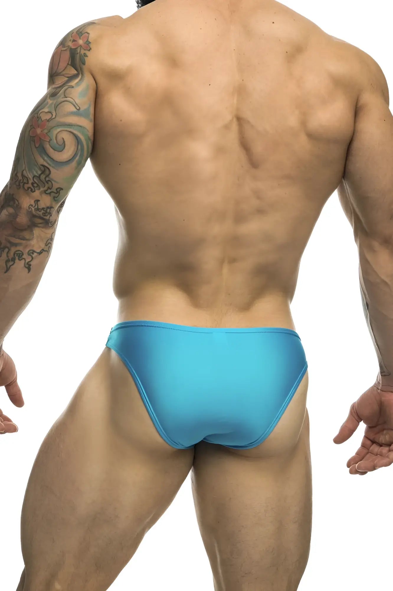 Classic bikini bright blue sleek one-piece swim trunks by JUSTIN SIMON XSJ01 in turquoise for swimming and beachwear