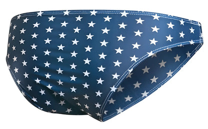 Blue swim trunks by JUSTIN+SIMON with white star pattern in classic bikini style USA flag design