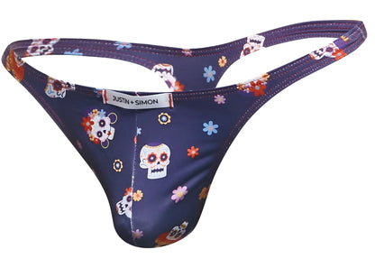 Dark blue classic thong with vibrant sugar skull and floral pattern and justin simon brand label visible on back side