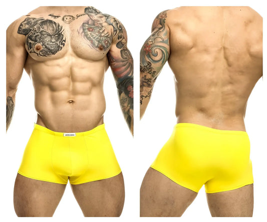 Bright yellow form-fitting men’s briefs with a small white brand tag at the waistband from justin simon xsj08 classic trunks