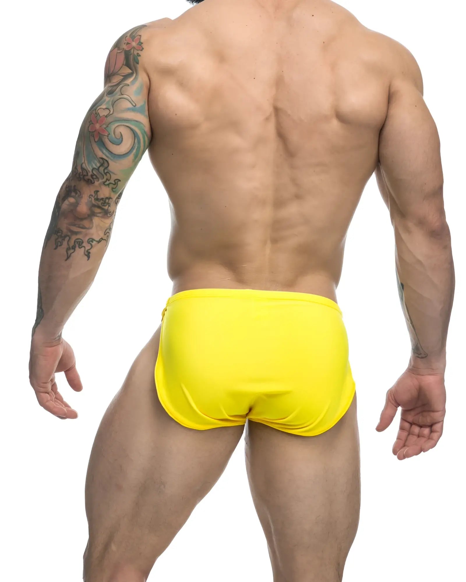 Bright yellow justin simon xsj09 running shorts made of lightweight fabric ideal for active use