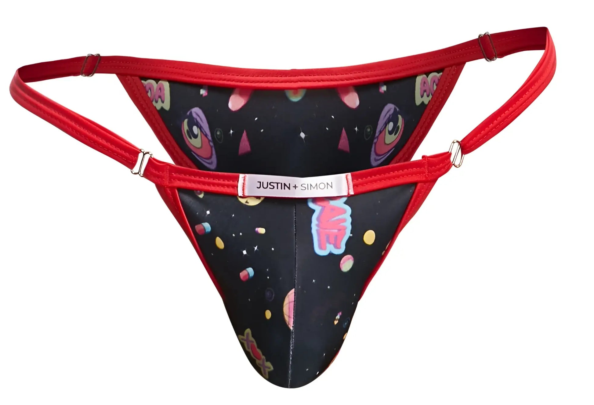 Red-trimmed bikini thong with black space-themed print featuring cartoon eyes planets and stars from justin simon