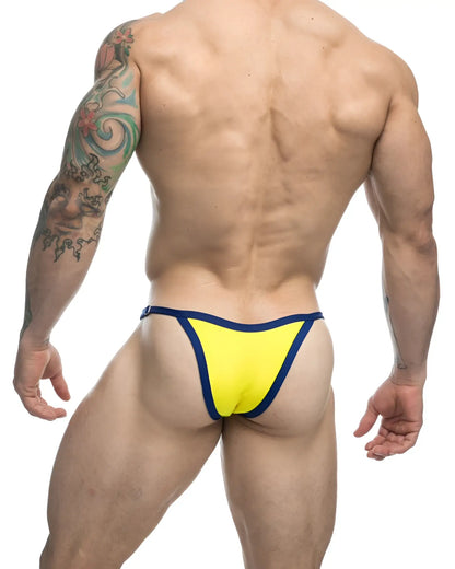 Bright yellow and navy blue thong bikini by justin simon with sleek form fitting design in one color yellow