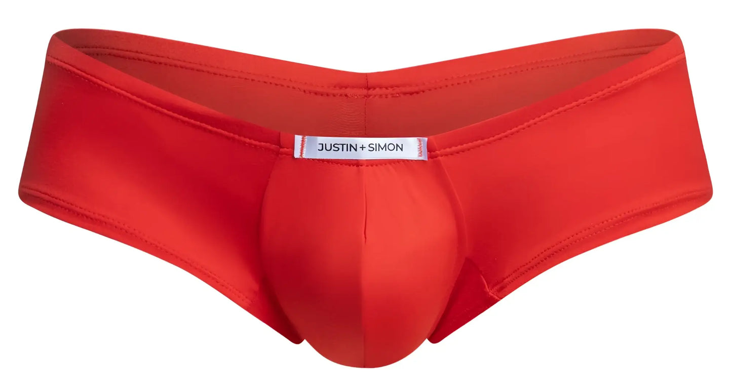 Bright red smooth men’s briefs with central pouch design and justin plus simon brand label in cheeky bulge boxer style