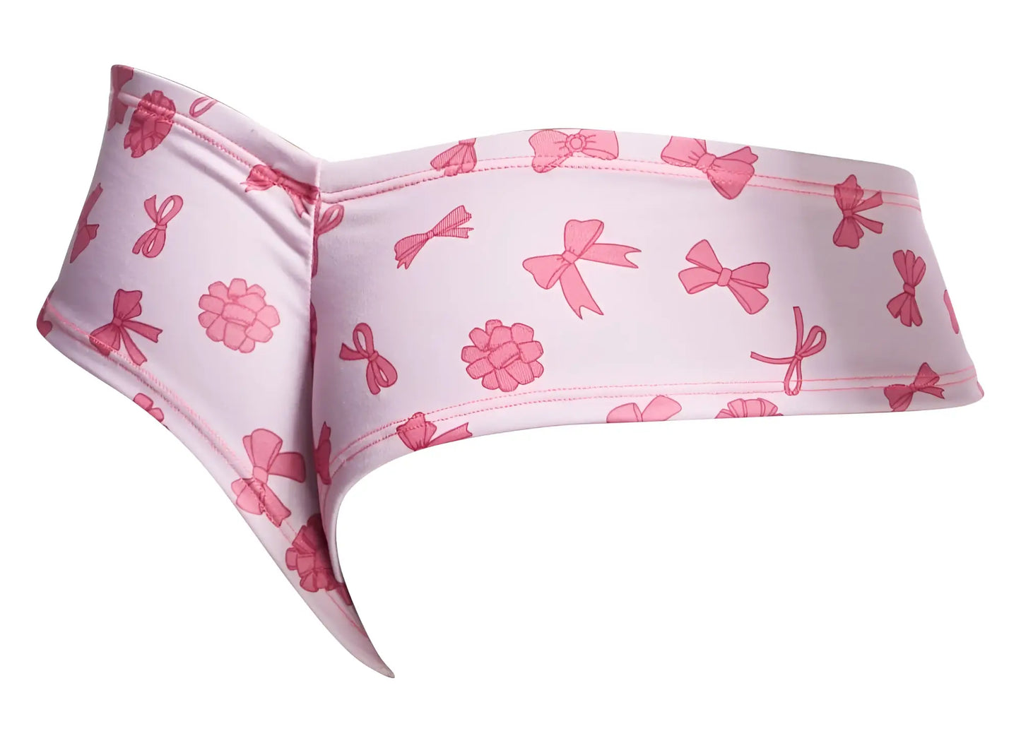 Pink patterned coquette bikini bottom with bows and raspberries on light pink fabric from justin+simon xsj22 series