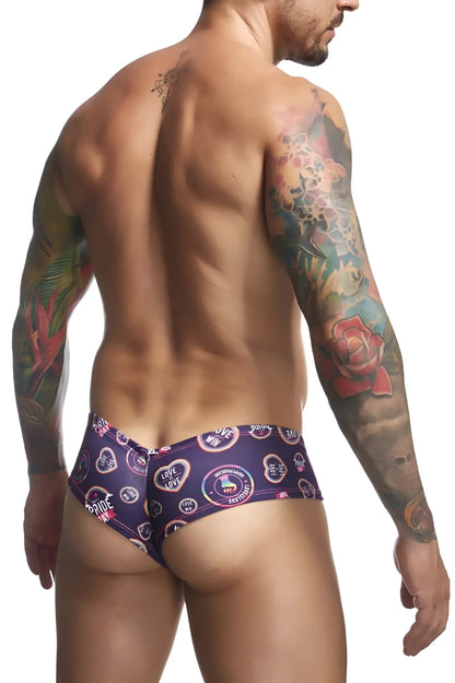 Purple patterned swim trunks with heart and love designs in a bold colorful print from justin+simon color pride collection