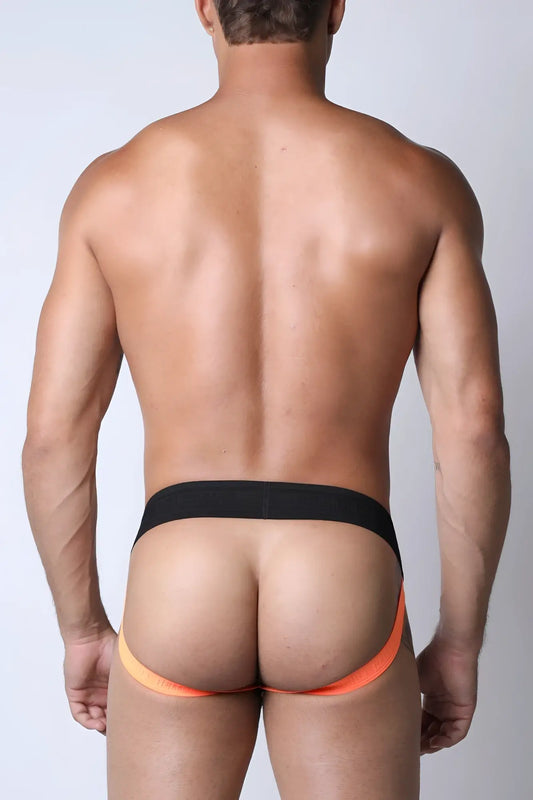 Kennel club lightning jockstrap black and orange athletic briefs with a snug form-fitting design for active wear