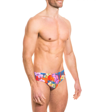 Kiniki continental tan through deep waist bikini swimwear in vibrant red blue and purple tropical floral swim trunks size s