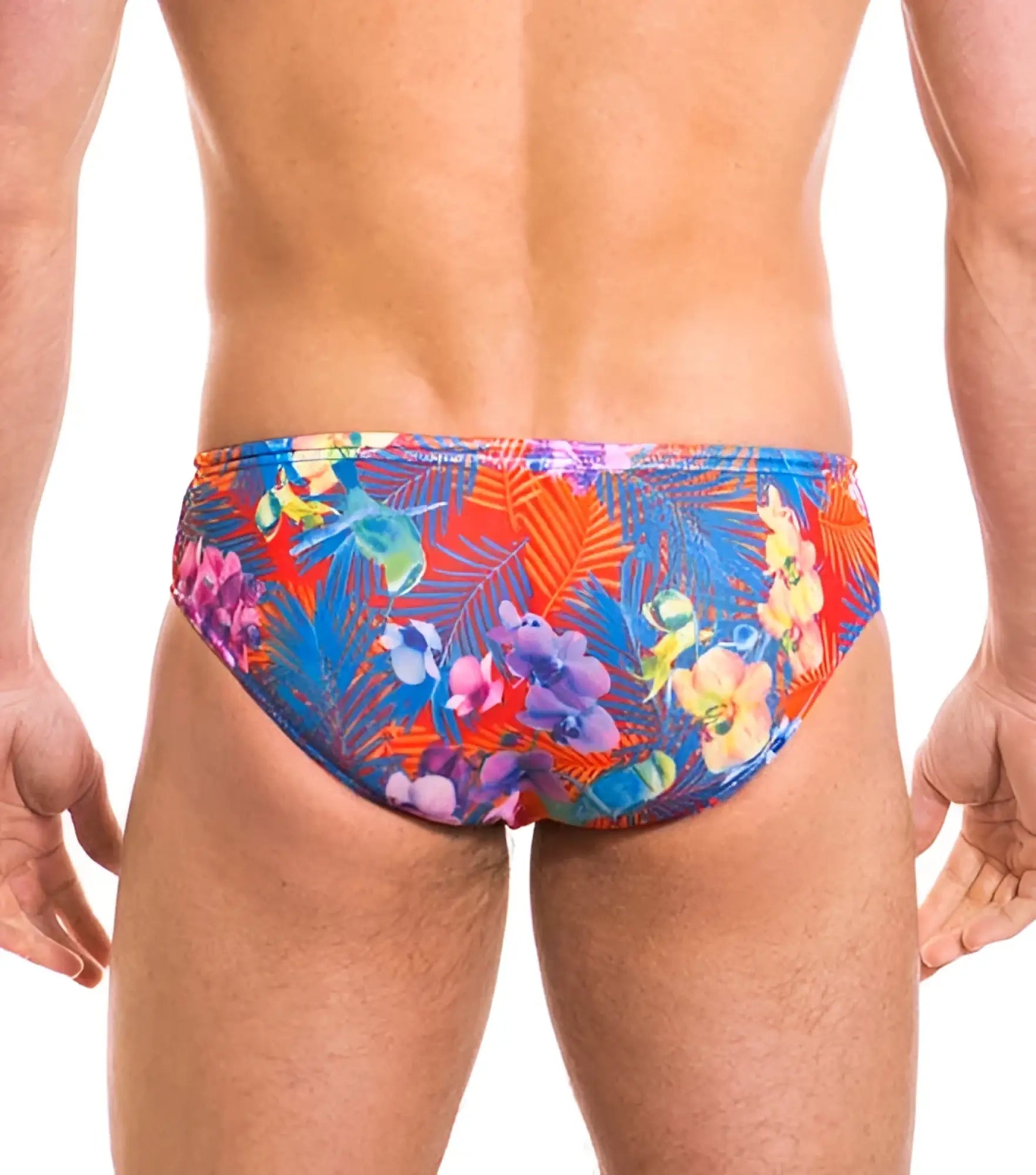 Kiniki continental tan through deep waist bikini swimwear in size s with vibrant tropical floral pattern in red blue purple