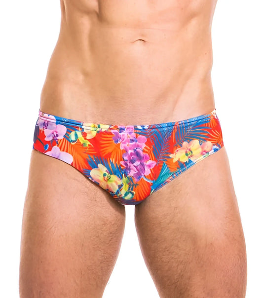 Vibrant tropical floral print kiniki continental tan through deep waist bikini swim trunks in red blue and purple hues size s