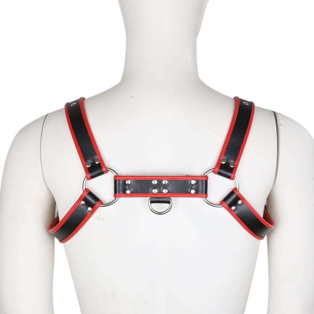 Black and red contrast trim leather harness with metal rings and rivets worn on a mannequin torso, back view.