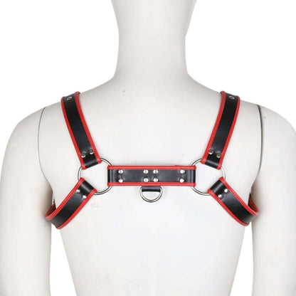 Black and red contrast trim leather harness with metal rings and rivets worn on a mannequin torso, back view.