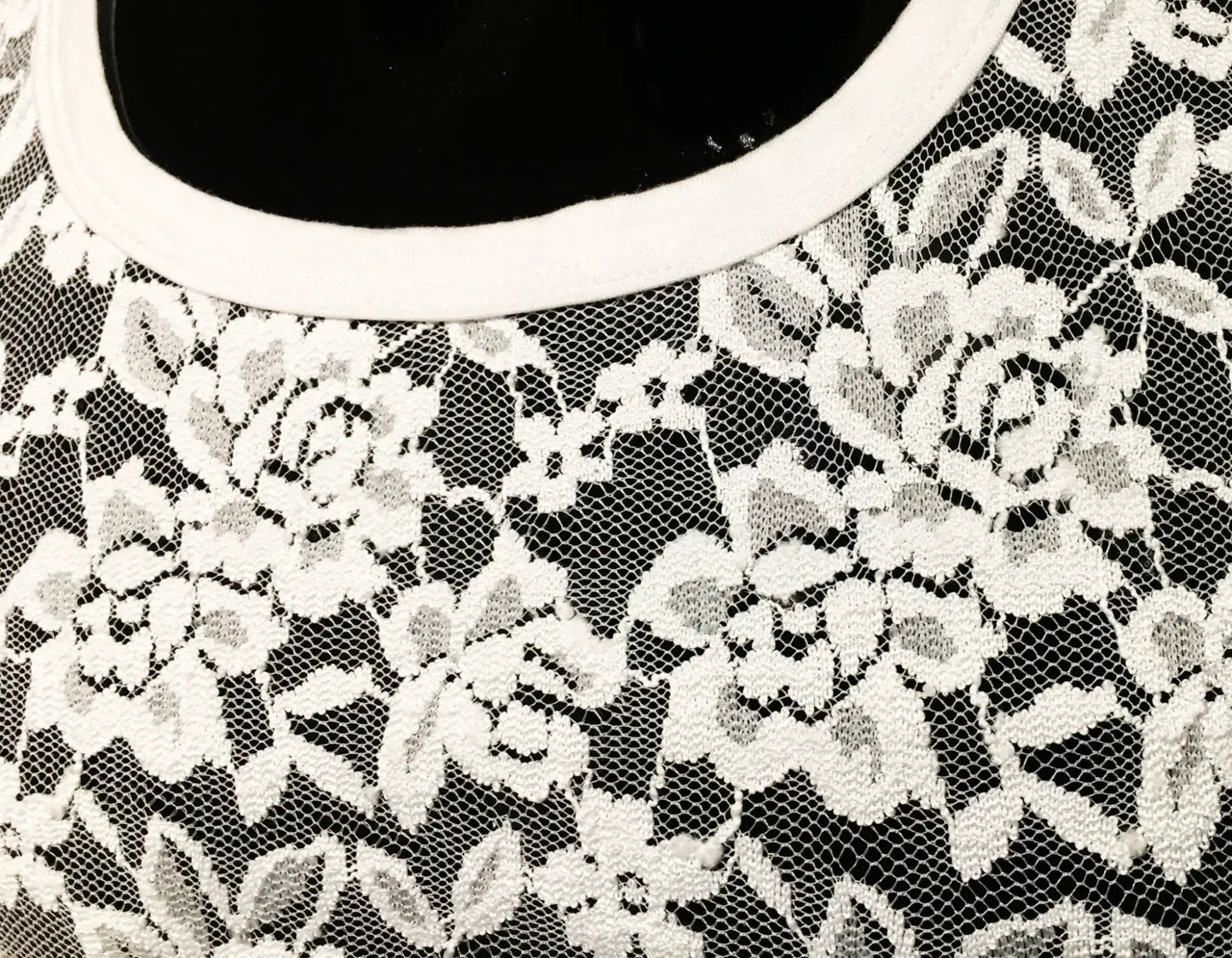 White floral lace tee with black base and clean white rounded neckline perfect for casual wear