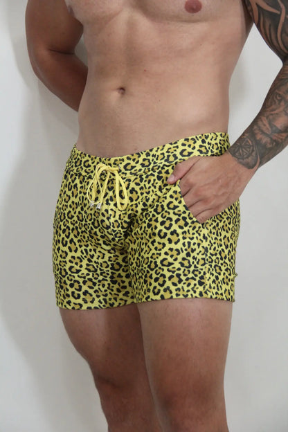 Bright yellow leopard fleece short swim trunks with matching drawstring waistband in soft fleece material