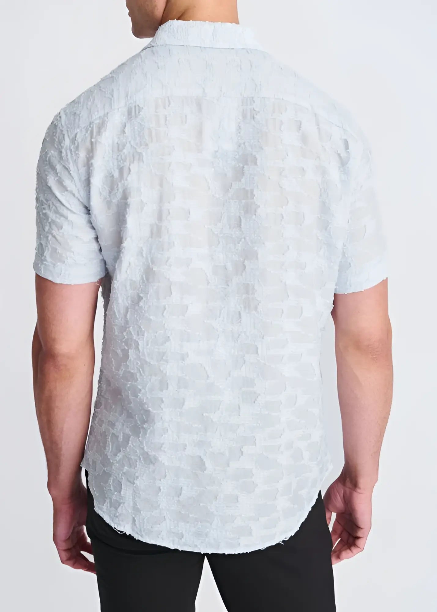 A light blue lightweight jacquard short-sleeved button-up shirt with a subtle textured pattern