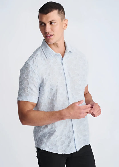 Light blue lightweight jacquard short-sleeved button-up shirt with a subtle textured pattern for warm weather wear