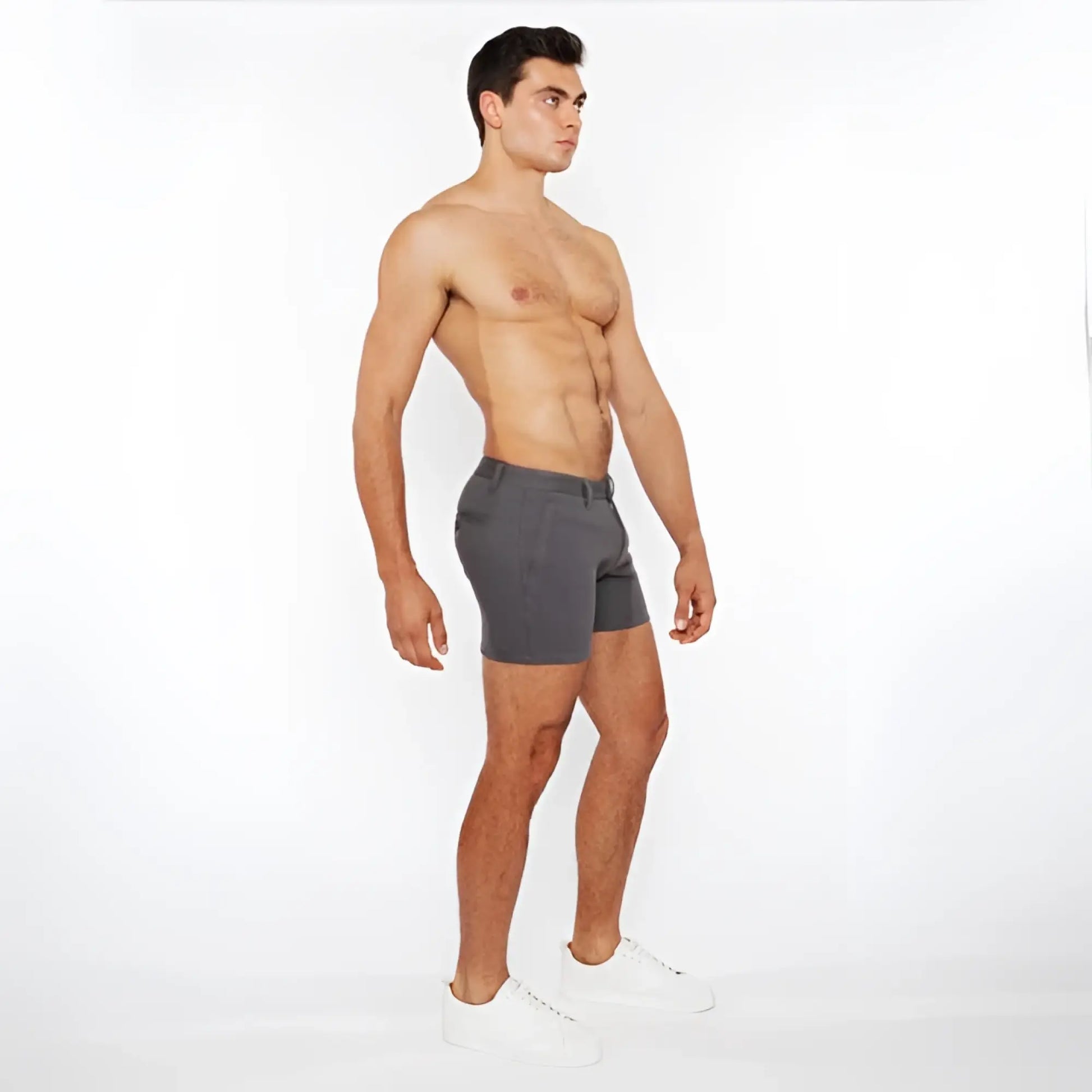 Gray linen-look textured athletic shorts with zip pockets and subtle waistband detail in a sleek modern design