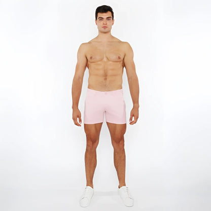 Pink linen-look textured athletic shorts with zip pockets perfect for activewear and casual use