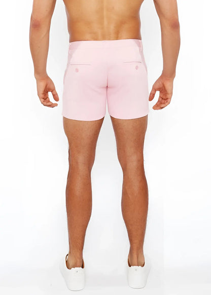 Pink linen-look textured men’s shorts with tailored fit and two back pockets shown from the back side