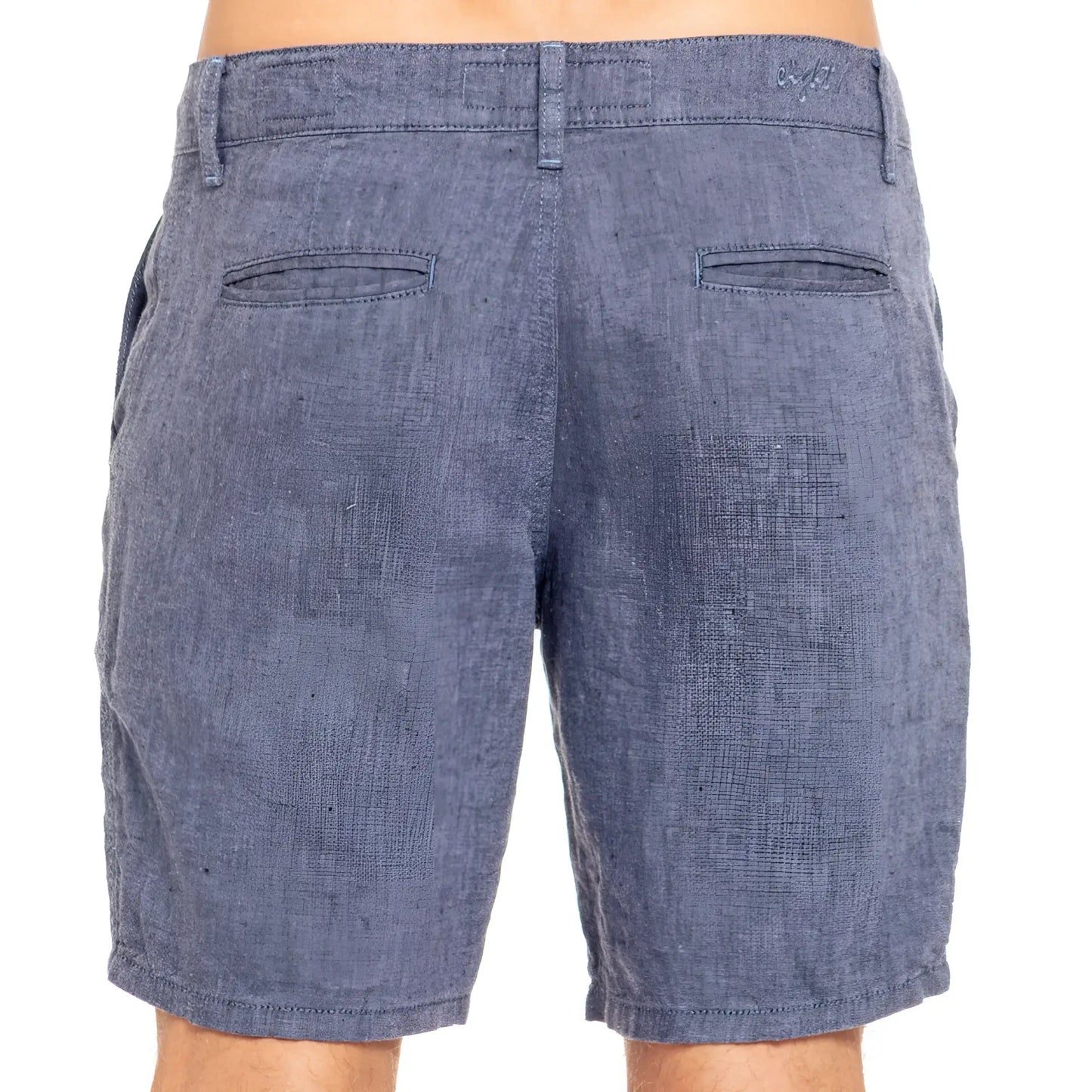 Blue linen slim fit shorts in denim with textured weave and two back pockets shown from the back side