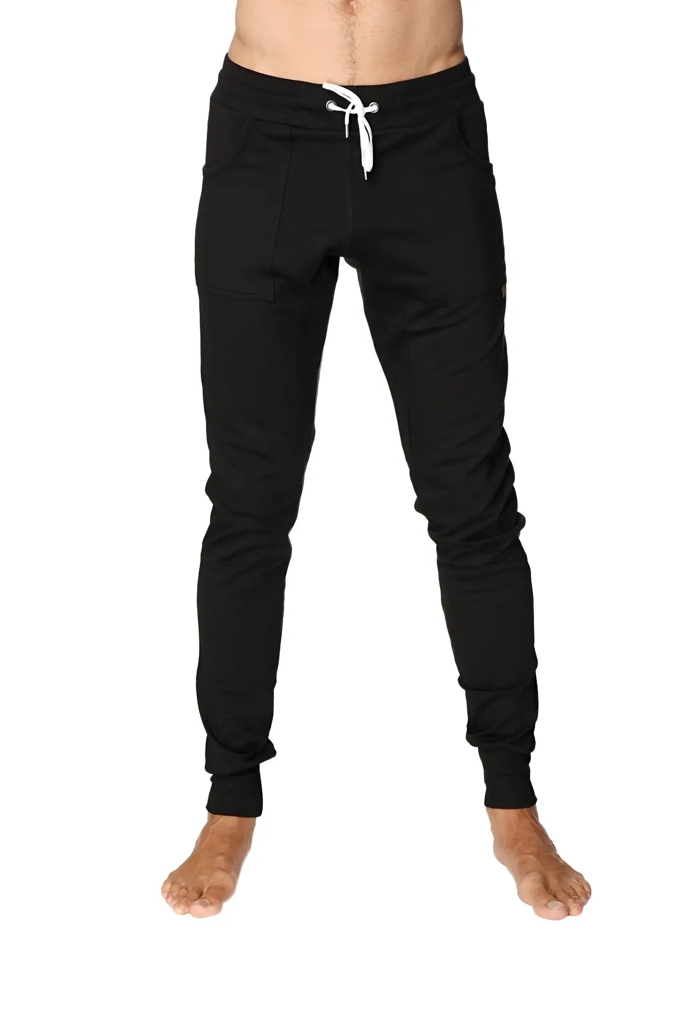 Long cuffed jogger and yoga sweat pants in black with white drawstring waistband and elastic cuffs for comfort