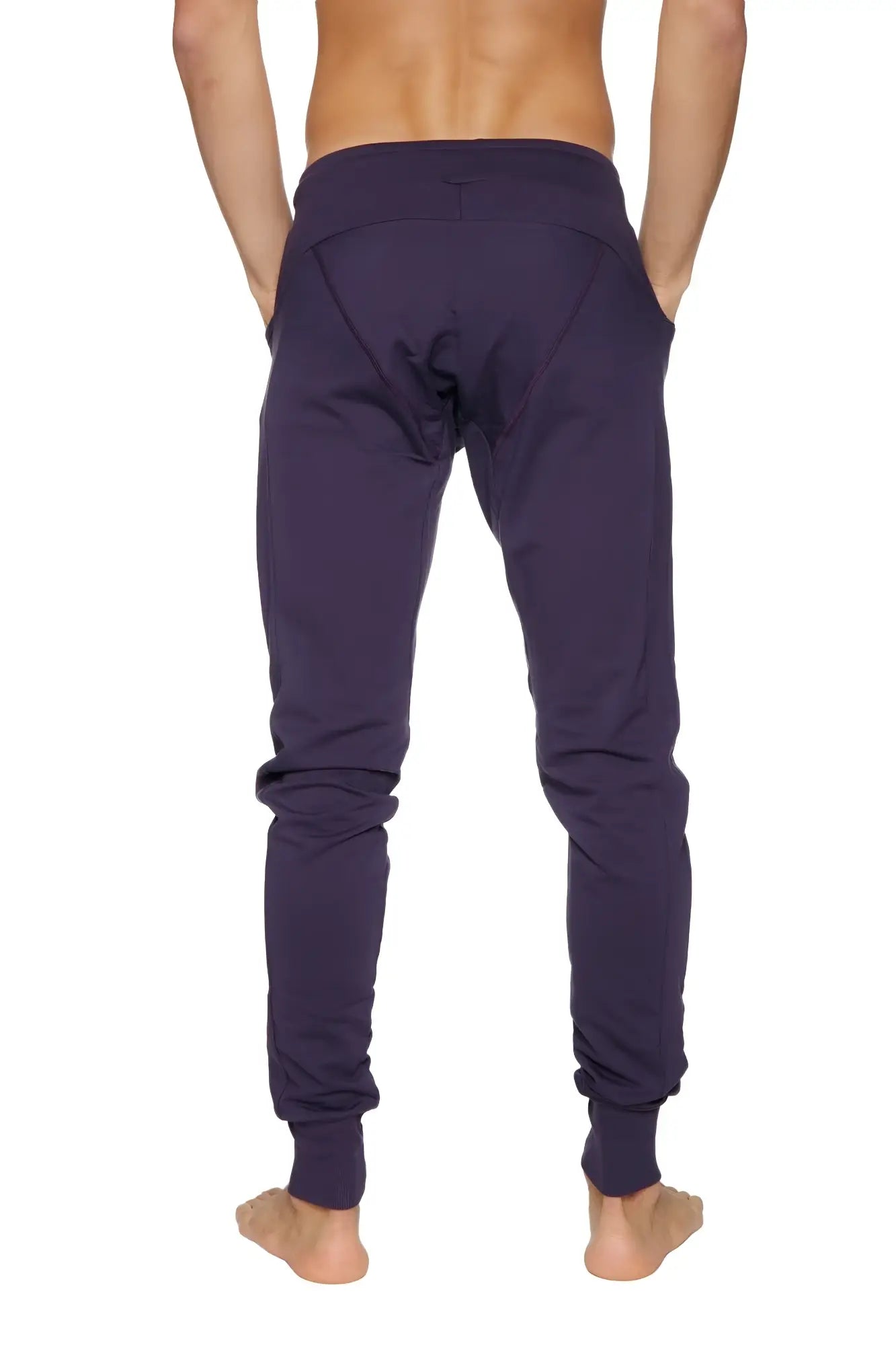 Long cuffed jogger and yoga sweat pants in dark purple soft fabric with elastic cuffs and a relaxed fit
